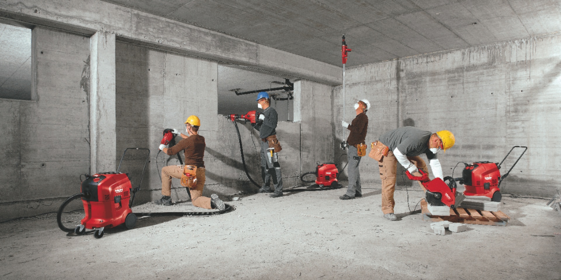 Image of all the full portfolio of Hilti vacuum cleaners being used on the construction site 